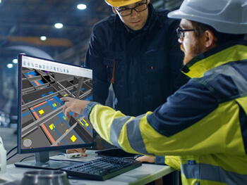 Two design-build construction experts discussing electrical needs
